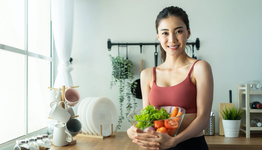 asian-attractive-sport-woman-holding-salad-bowl-an-2021-12-09-15-16-10-XJ3SGYZ.jpg