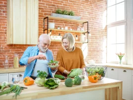 senior-couple-with-healthy-food-at-home-2022-01-19-00-03-35-DT3258E